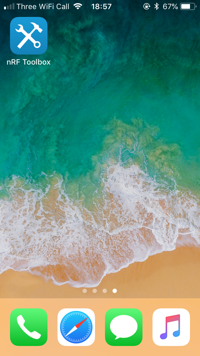 A beach with waves crashing on the sand

Description automatically generated